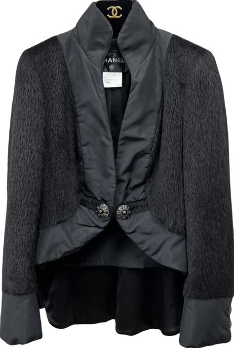 La petite veste noire wool jacket Chanel Black size 40 FR in Wool 